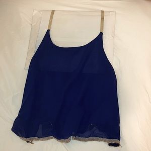 Navy blue silk flow tank with gold straps & trim